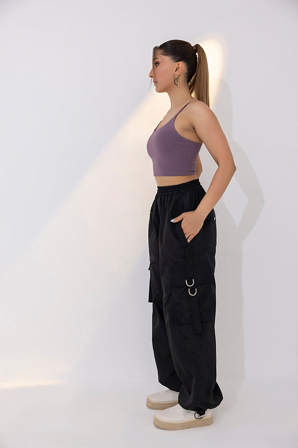 Women's black parachute cargo pants.