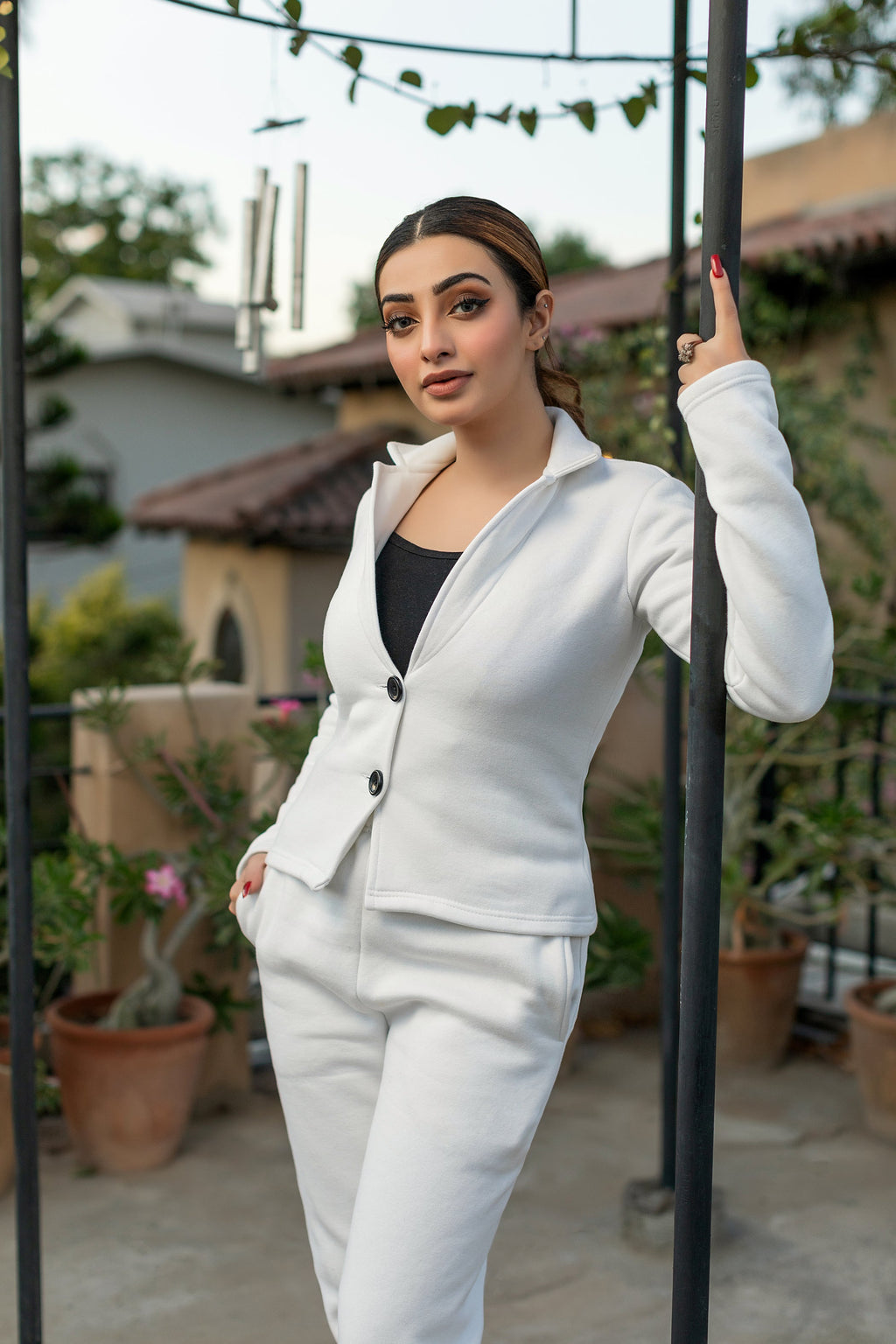 Women's white fleece coat style tracksuit.