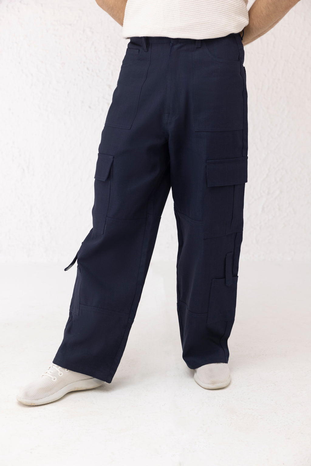 Front view of Aether wide leg cargo pants in navy twill with minimal 4-pocket design – Decuir