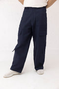 Front view of Aether wide leg cargo pants in navy twill with minimal 4-pocket design – Decuir