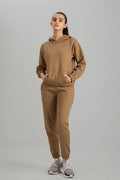 Women's Camel brown crop style tracksuit.