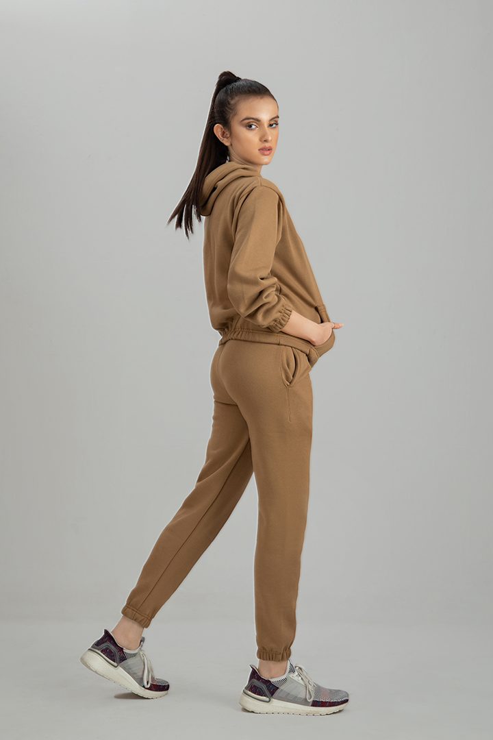 Women's Camel brown crop style tracksuit.