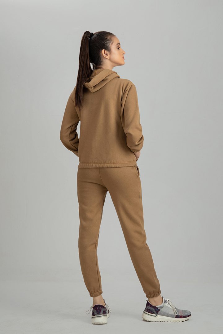 Women's Camel brown crop style tracksuit.